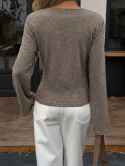 Elegant V-neck Wrap Asymmetrical Blouse in Milky White, close-up detail