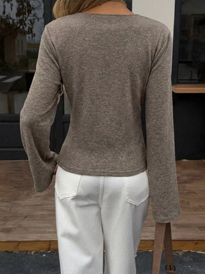 Elegant V-neck Wrap Asymmetrical Blouse in Milky White, close-up detail