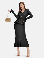 Black knit cardigan set with ruffled hem and flared skirt.