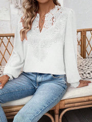 White embroidered yoke blouse with puff sleeves and lace detail