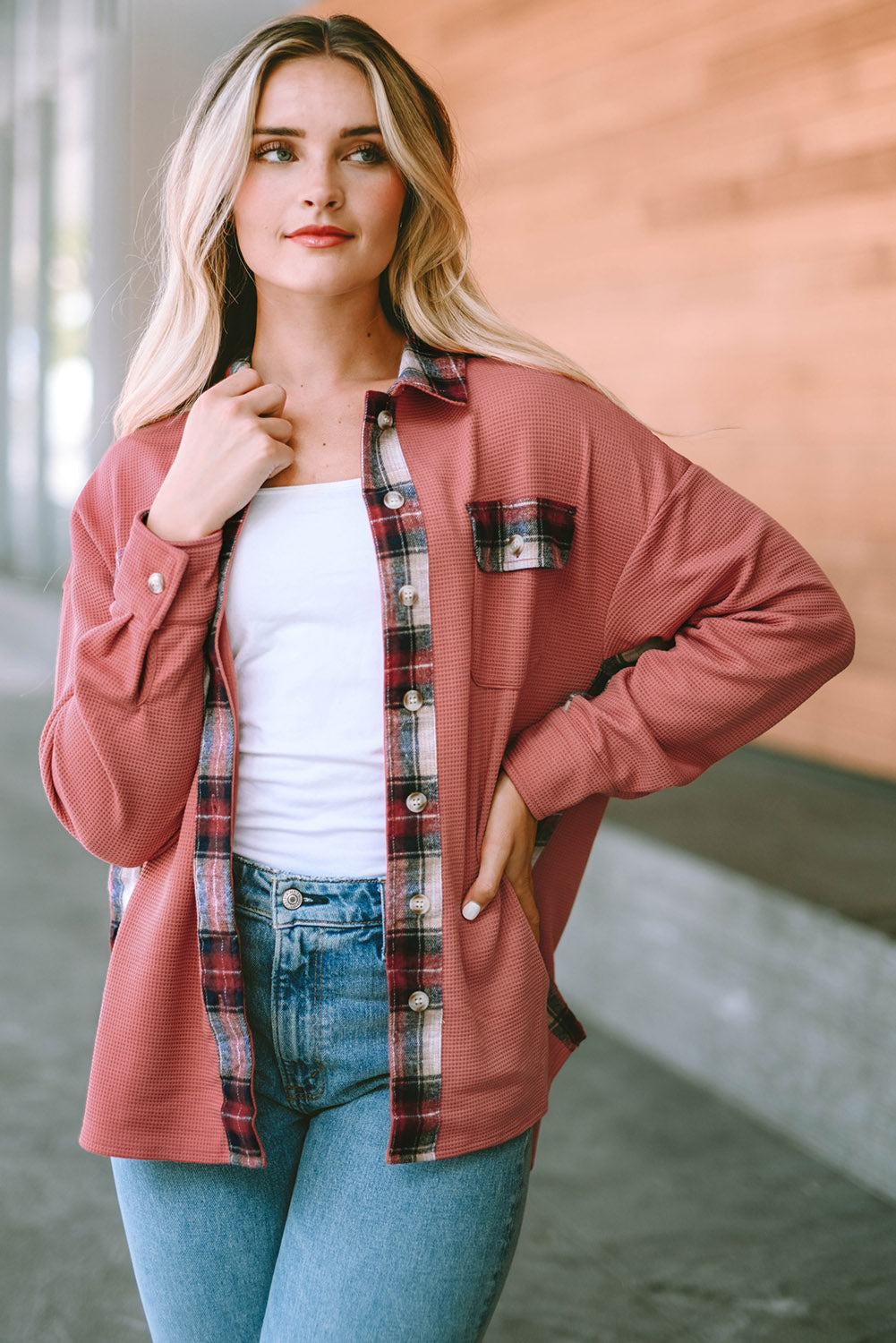 Waffle knit overshirt in blush pink with plaid trim and button front.