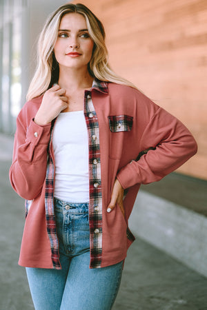 Waffle knit overshirt in blush pink with plaid trim and button front.