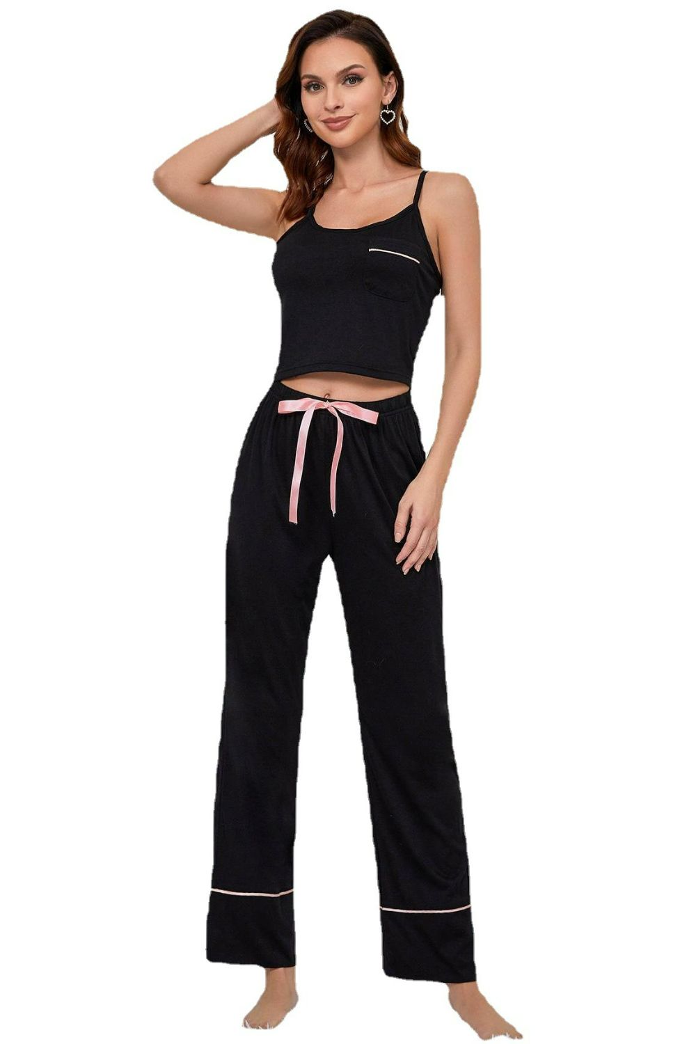 Black cami and lounge pants set with pink trim and drawstring waist.