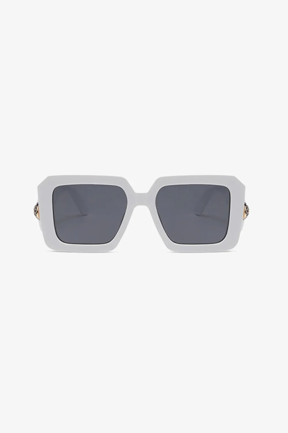 White geometric facet sunglasses with embellished temples and dark lenses.