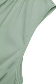 Elegant high-low a-line dress in sage green with ruched waist detail and cap sleeves.