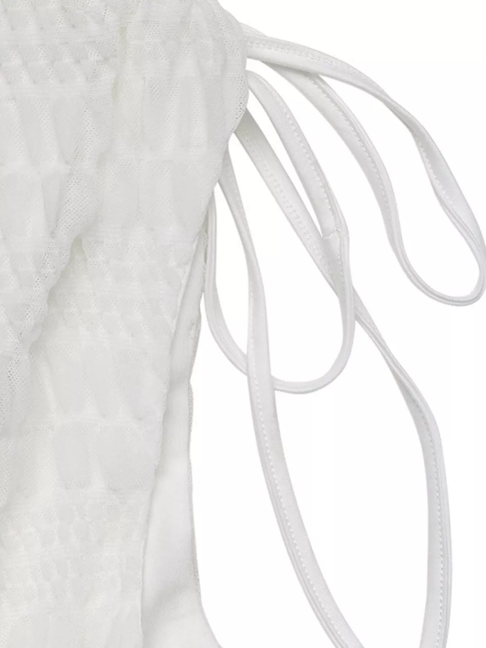 White textured smocked dress with deep V-neck and adjustable tie straps.