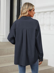 Dark Navy corduroy overshirt with back pleat detail and buttoned cuffs.