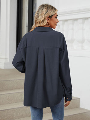 Dark Navy corduroy overshirt with back pleat detail and buttoned cuffs.