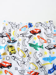 Toddler underwear with a white background and a colorful vehicle print featuring cars, planes, rockets, and sharks.