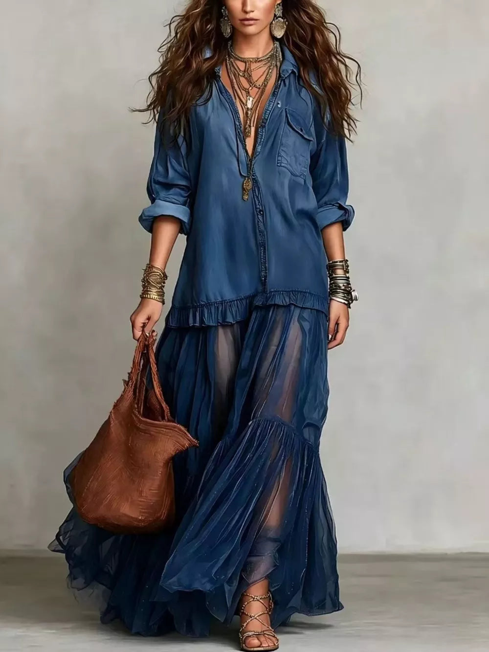 Dark blue sheer ruffle maxi dress with buttoned detailing and long sleeves.