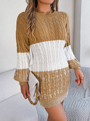 Colorblock cable knit mini dress in camel, white, and tan acrylic with crew neck and long sleeves.