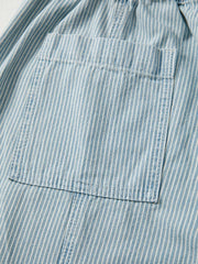 Light blue striped denim jeans with drawstring waist and back pocket detail.