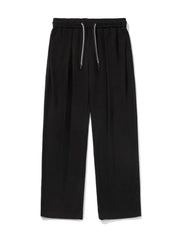 Black oversized drape-front lounge trousers with drawstring waist and wide leg.