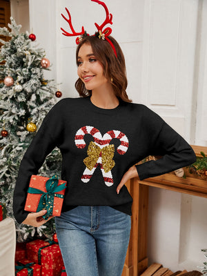 Black acrylic sweater with sequin candy cane and bow detail, crew neck, long sleeves.