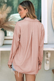 Oversized stripe Oxford shirt in Burnt Coral with buttoned cuffs and a back pleat detail.