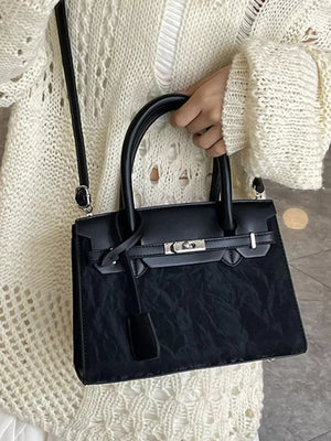 Textured Leather Top-handle Handbag in Black, close-up detail