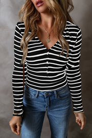 Ribbed black and white stripe long sleeve henley top with button detail