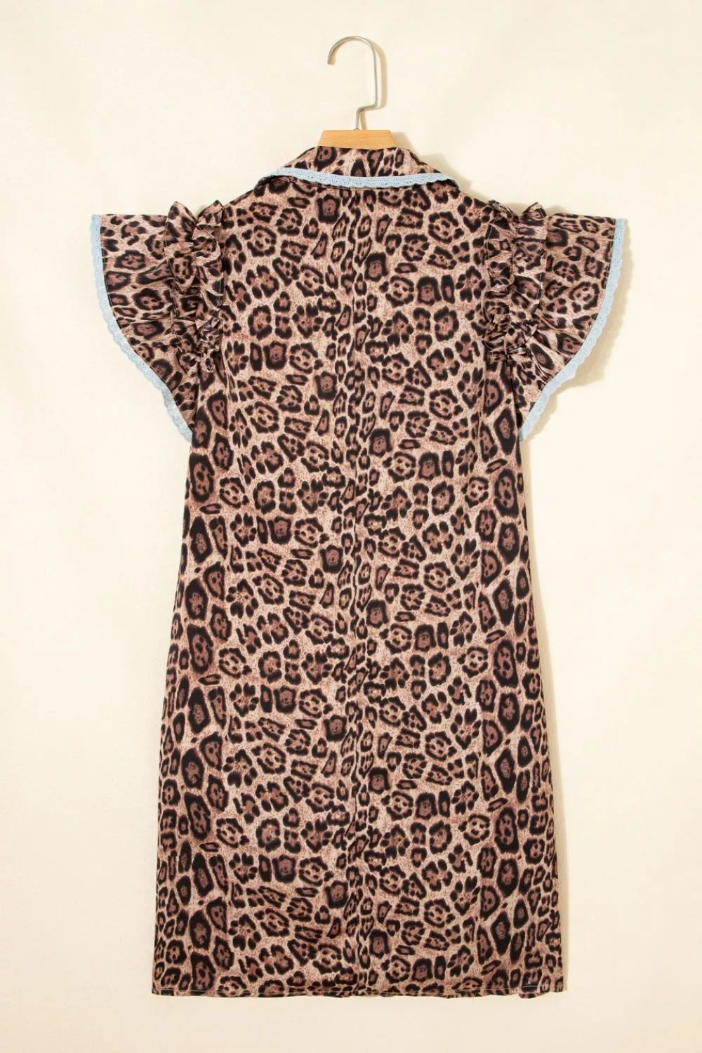Leopard print cotton mini dress with ruffle sleeves and light blue lace trim.