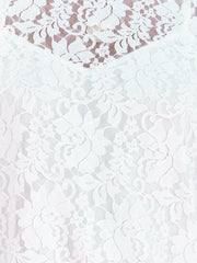 White lace short sleeve blouse with floral pattern and sheer overlay detail.