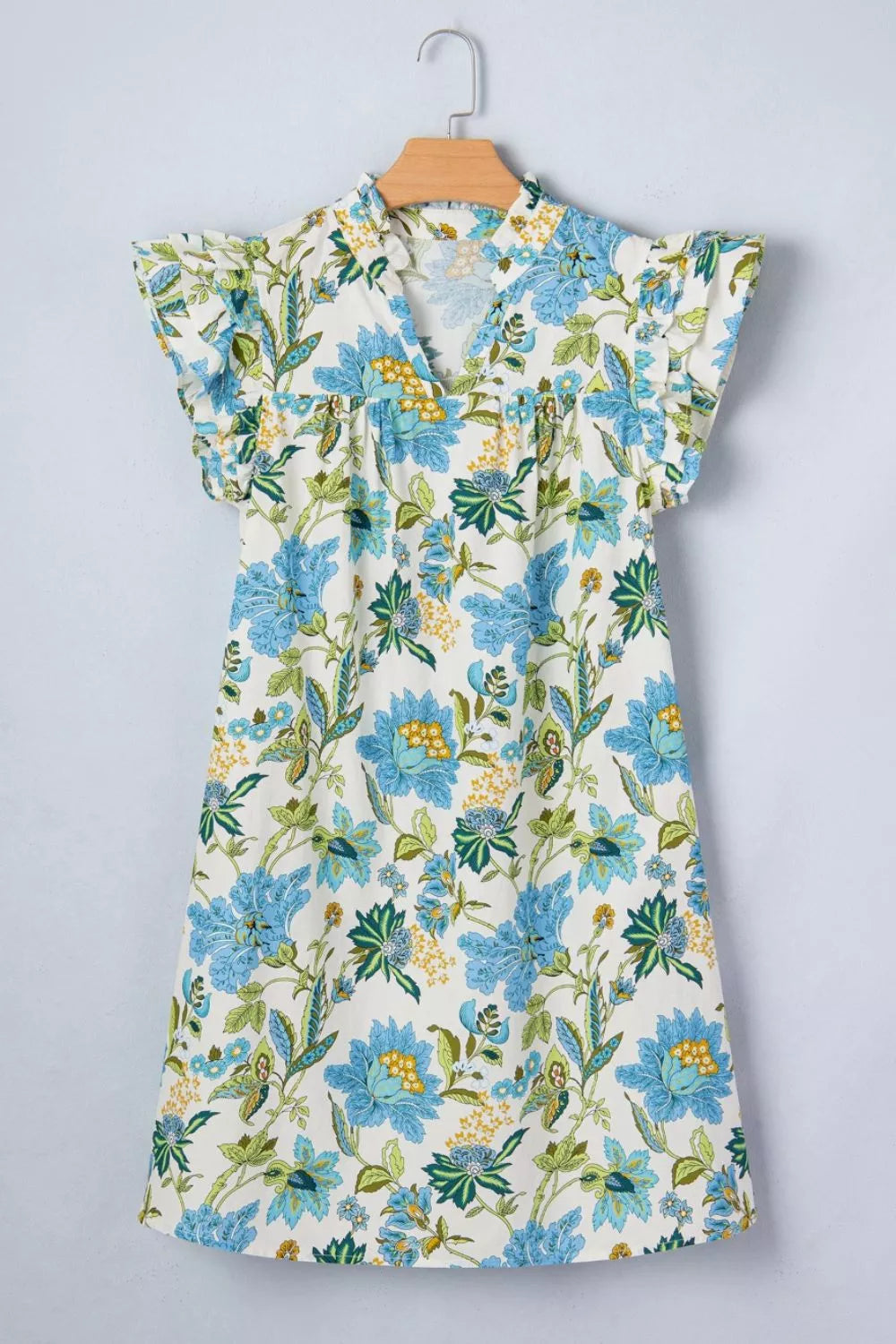 Floral v-neck mini dress with ruffled sleeves in cotton, featuring a blue and green floral print.