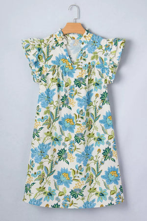 Floral v-neck mini dress with ruffled sleeves in cotton, featuring a blue and green floral print.