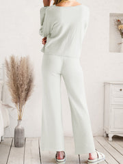 Light gray acrylic wide-leg loungewear set with a relaxed fit sweater and pants.