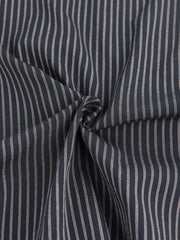 Chic striped sleeveless top and wide-leg pants set fabric detail in blue with thin white pinstripes.