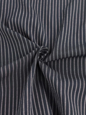 Chic striped sleeveless top and wide-leg pants set fabric detail in blue with thin white pinstripes.