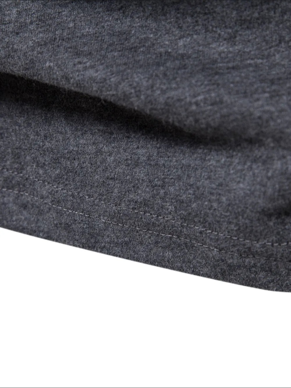 Dark gray crewneck long sleeve tee with visible stitching detail.