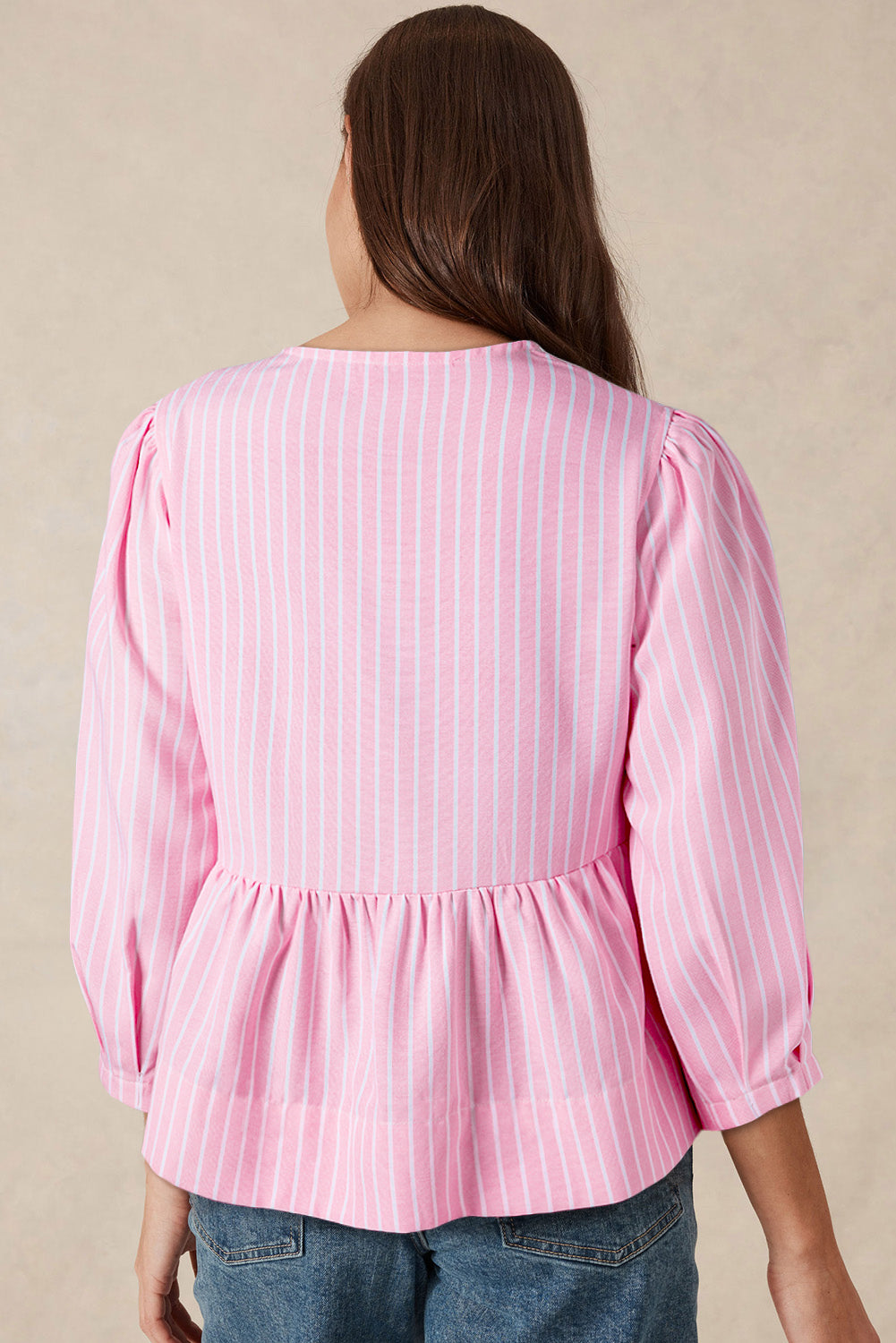 Blush pink striped peplum blouse with puff sleeves and gathered waist