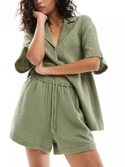 Army green crinkle cotton pajama set with button-up shirt and drawstring shorts