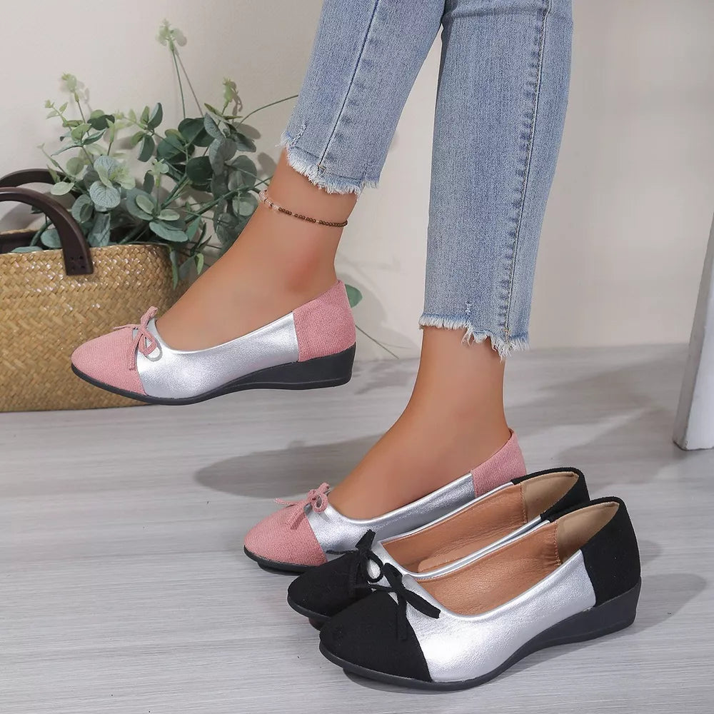 Pink and silver slip-on flats with bow detail, also shown in black.