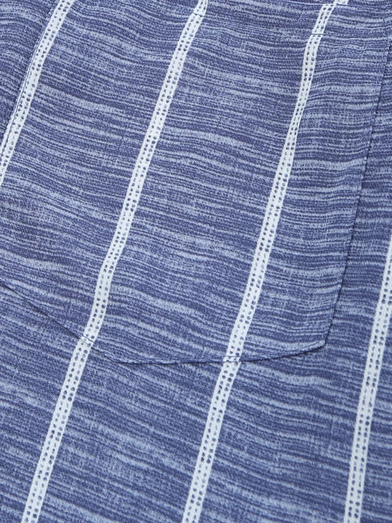 Dusty blue striped buttoned blouse with a chest pocket detail.