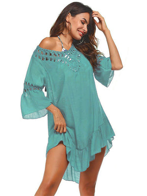 Turquoise lace-trimmed cover-up with keyhole back and ruffled hem