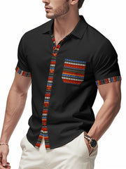 Black cotton short sleeve button-down shirt with vibrant trim on placket, pocket, and cuffs.