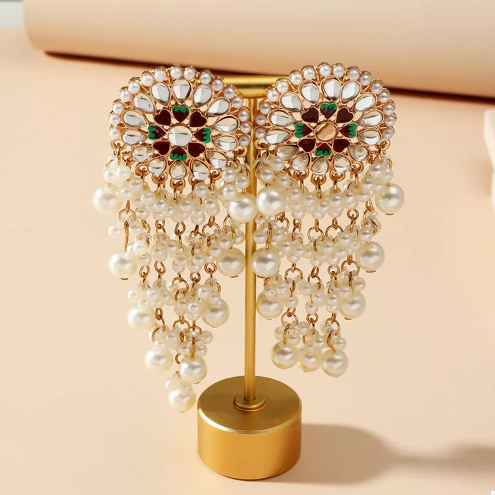 Lustrous pearl fringe statement earrings with gold alloy and colorful accents.