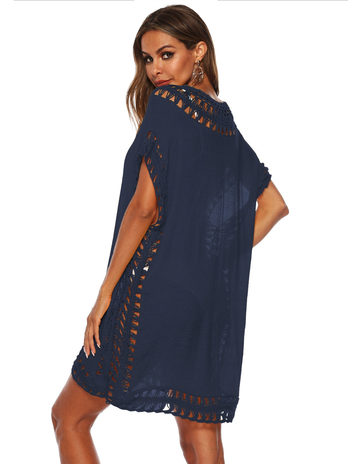 Dark blue kaftan cover-up with crochet trim detail and short sleeves.