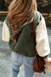 Moss corduroy bomber jacket with sherpa sleeves and contrast trim.