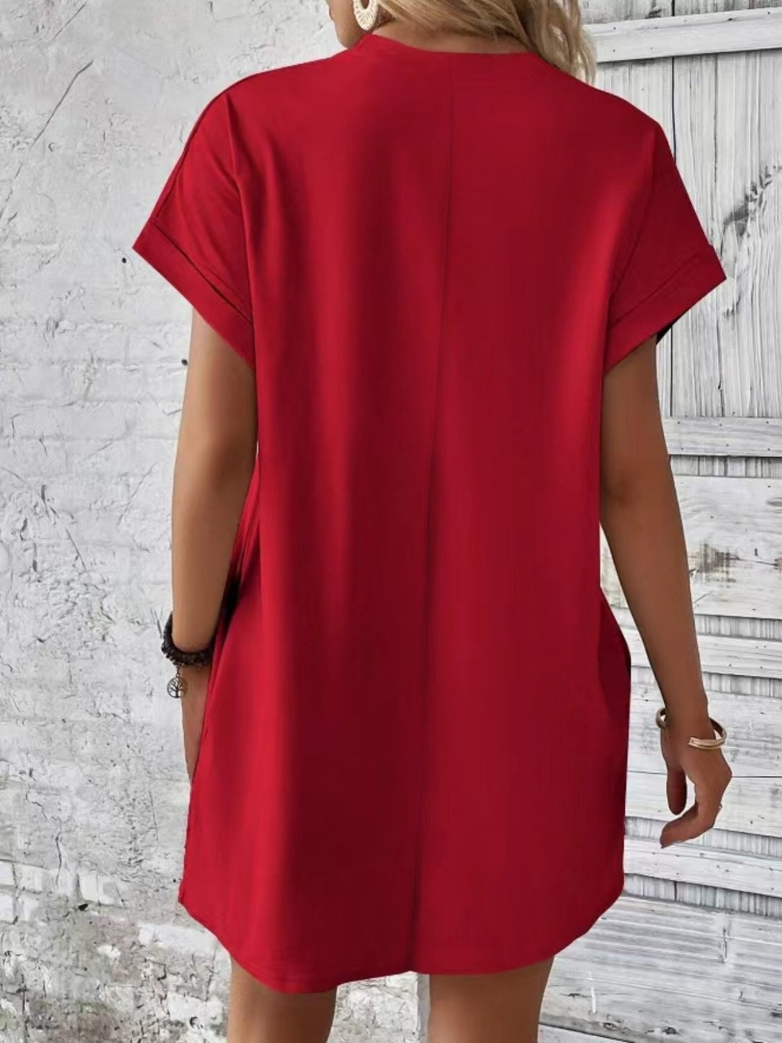 Red relaxed tee dress with cuffed sleeves and pockets, casual style