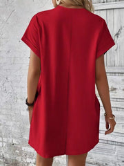 Red relaxed tee dress with cuffed sleeves and pockets, casual style