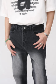 Faded wash baggy jeans in dark with a gradient effect, relaxed fit.