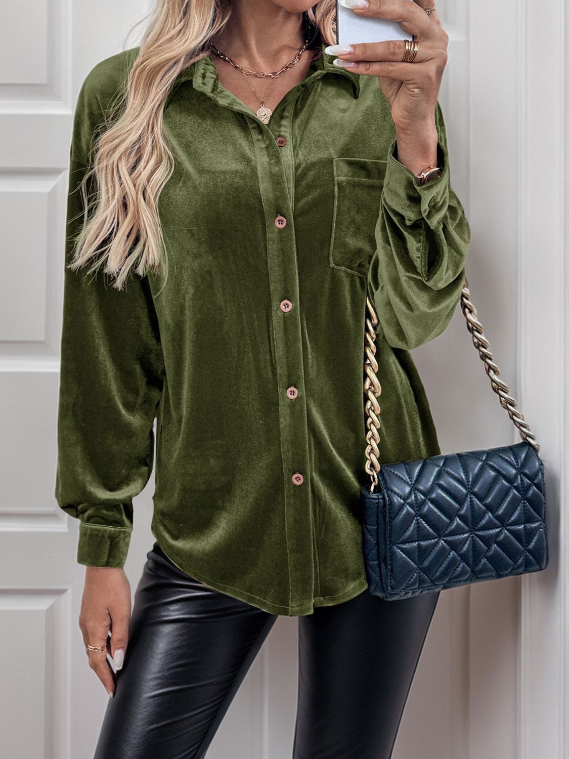 Moss velvet blouson sleeve button-up shirt with a pocket and collared neckline.