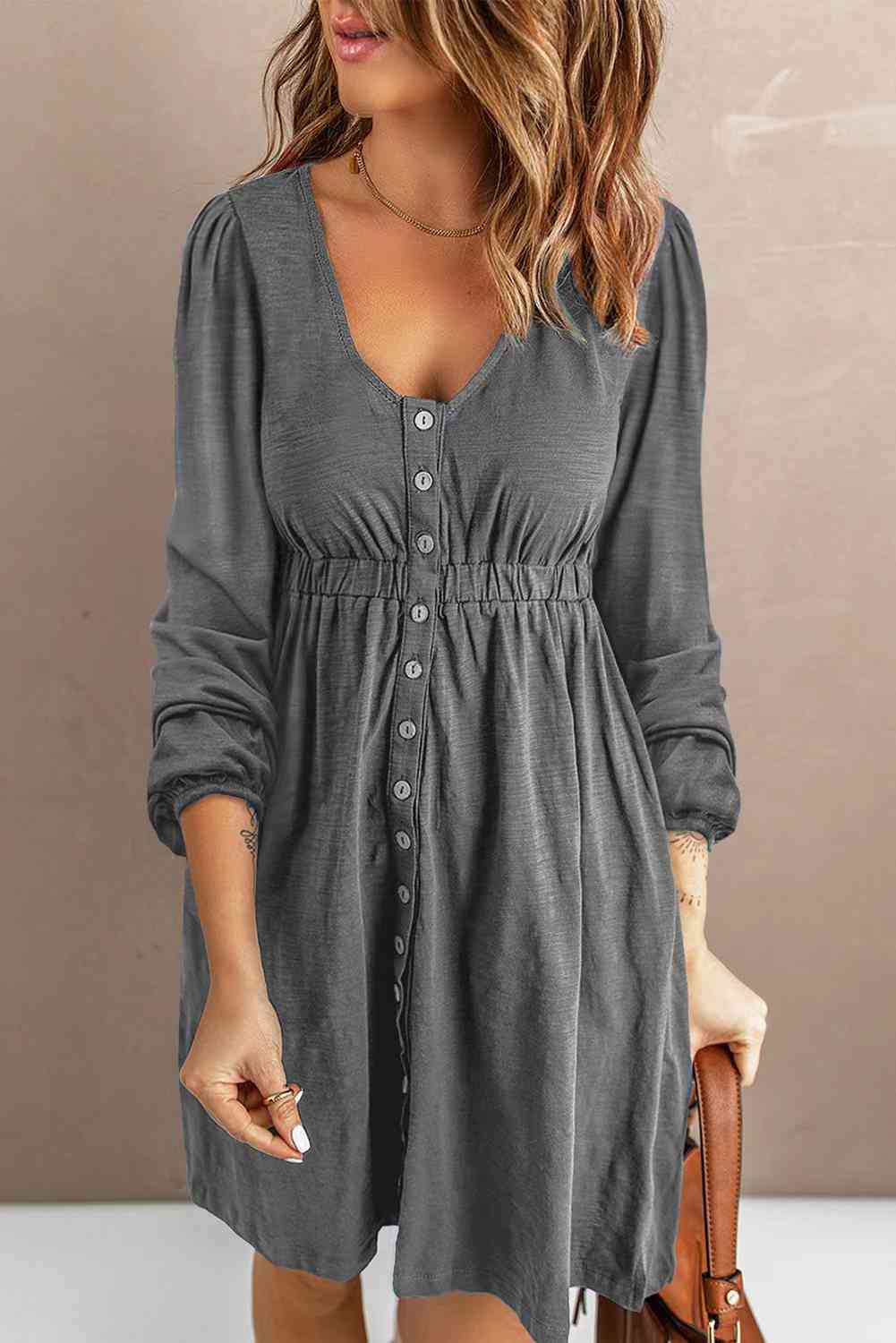 Gray button-down empire waist mini dress with V-neck and long sleeves