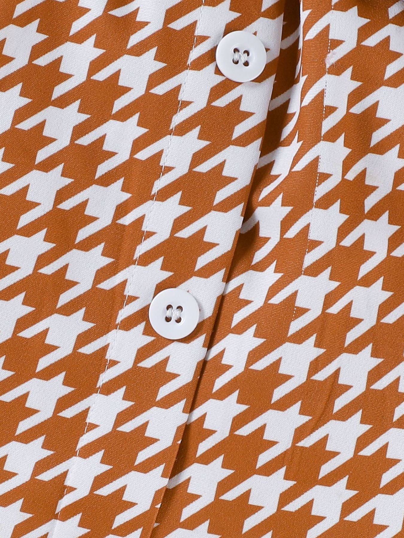 Toddler orange and white houndstooth button-down vest detail