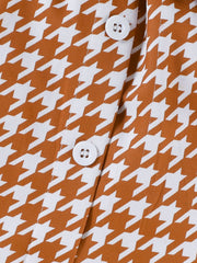 Toddler orange and white houndstooth button-down vest detail