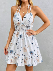 Floral print halter neck mini dress with smocked waist and ruffled hem in white, peach, sky-blue.