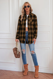 Plaid drop-shoulder jacket in caramel and black, buttoned with a chest pocket.