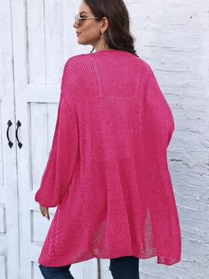 Cable knit cocoon cardigan in Deep Rose acrylic with open knit details and braided hem.