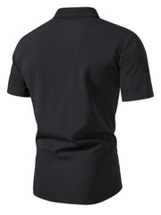 Men's black short sleeve button-up shirt with textured fabric and band collar.