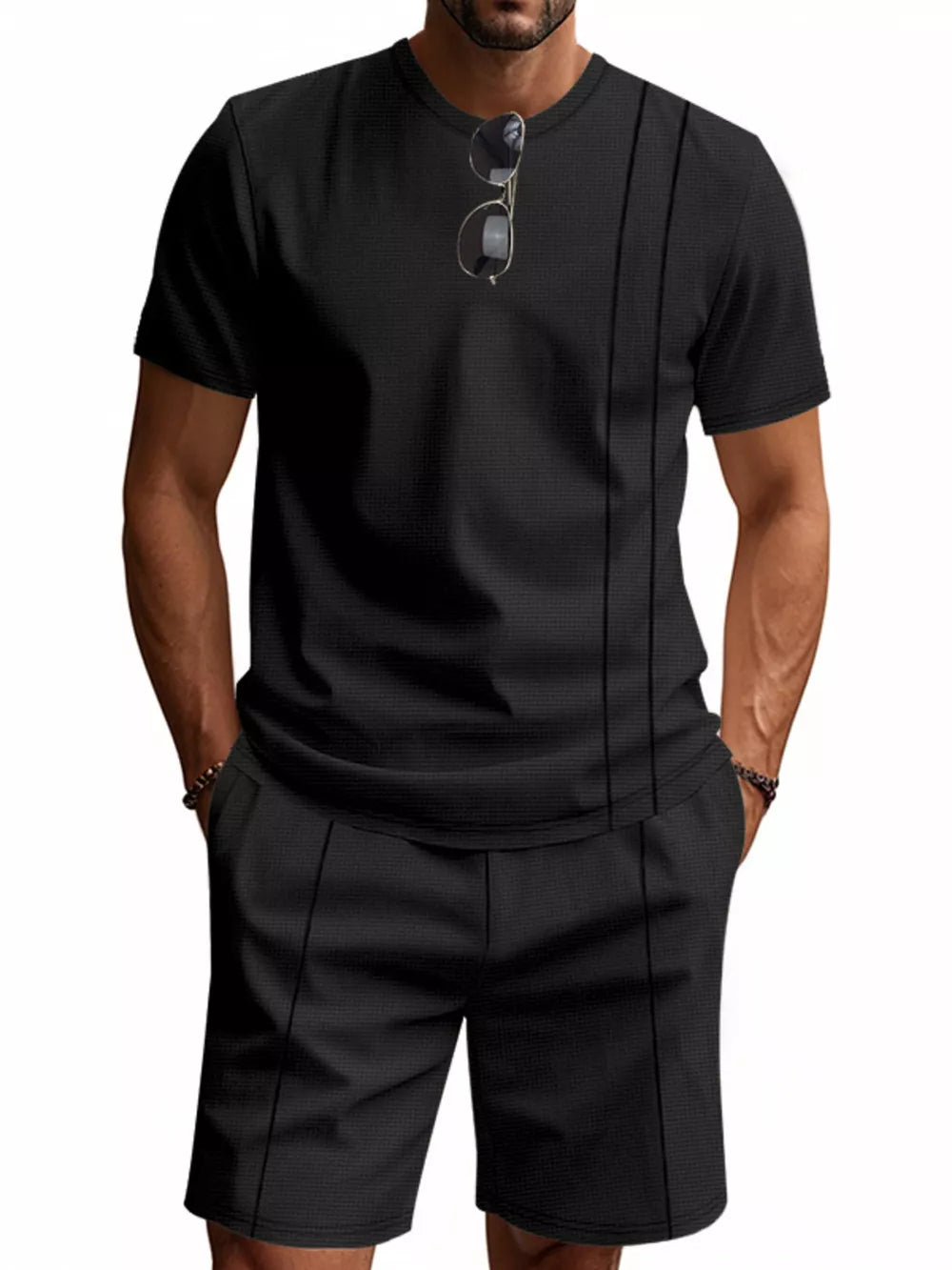 Black waffle-knit crew neck t-shirt and shorts set with vertical seam detail.